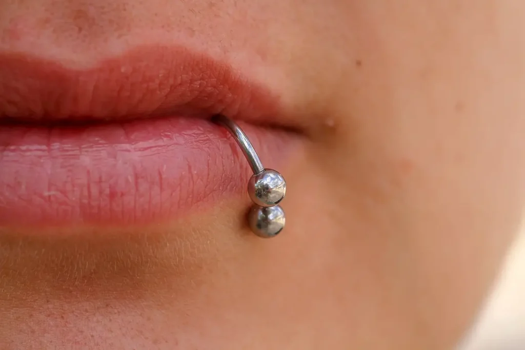 Close up of lips with a piercing